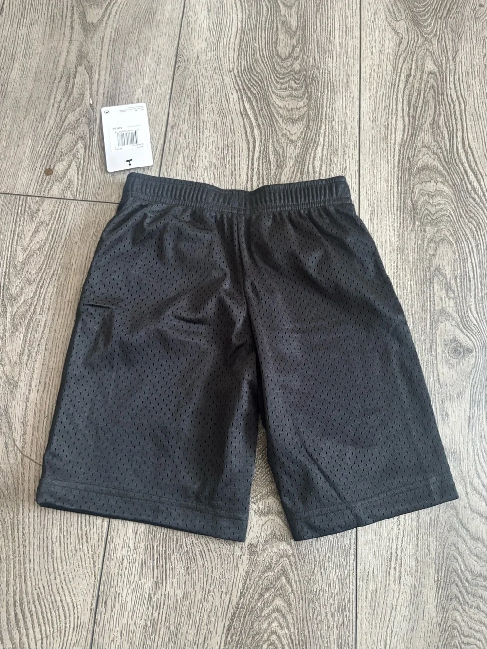 Nike Black Athletic Shorts with White Swoosh